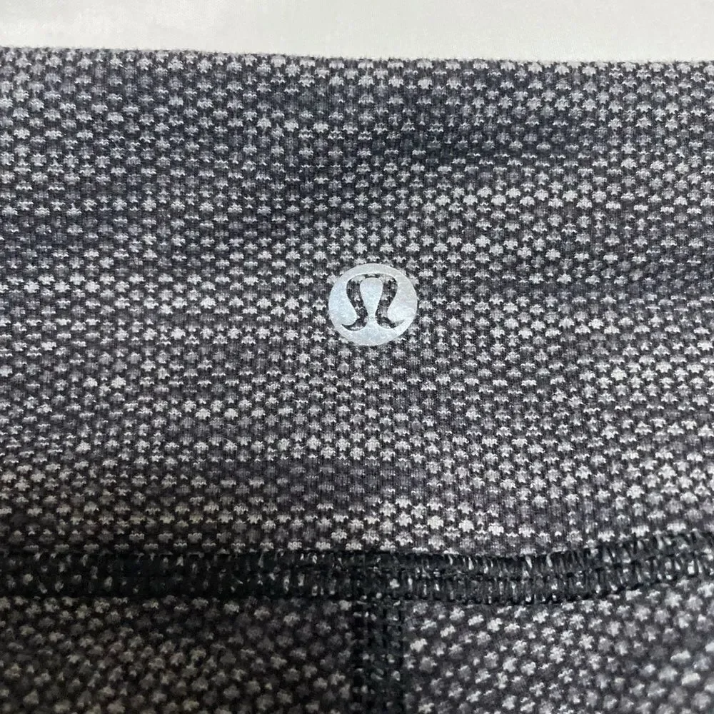 Lululemon Soul Cycle Grey Cropped Leggings Skull and Crossbones Size 4